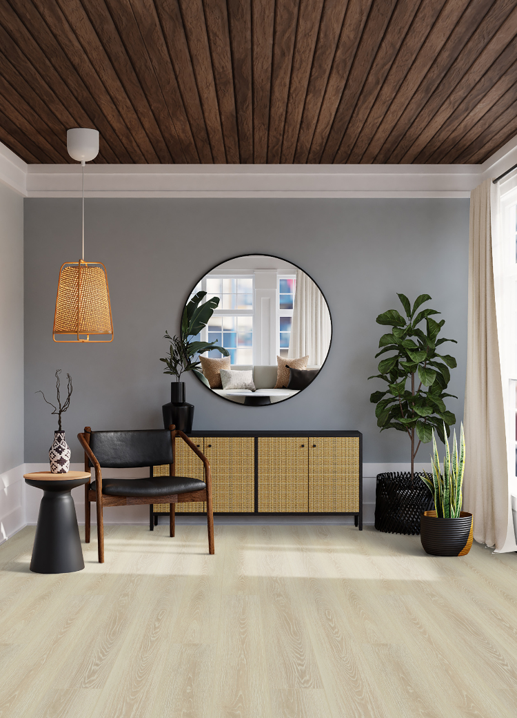 hardwood flooring in entryway with chair and natural decor.